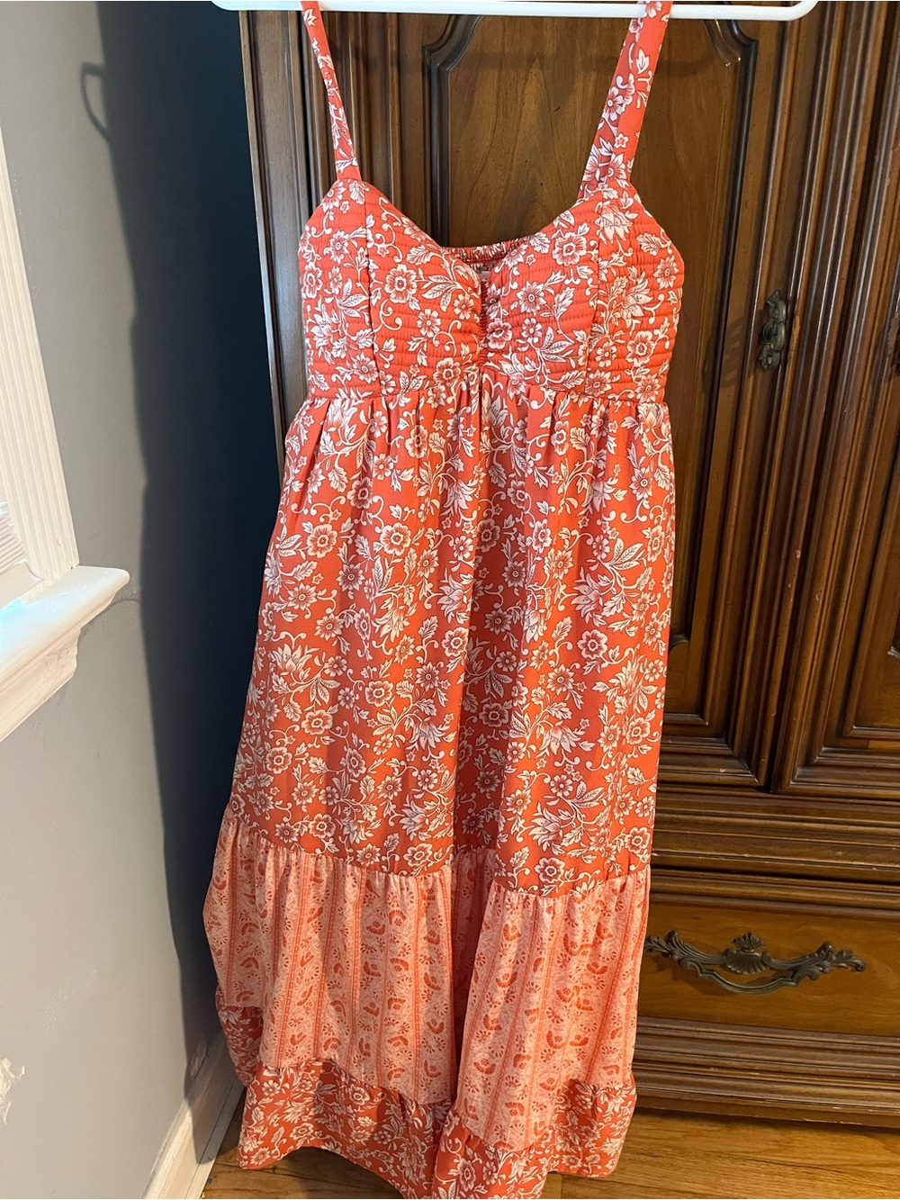 Orange and white floral maxi dress with ruffle hem